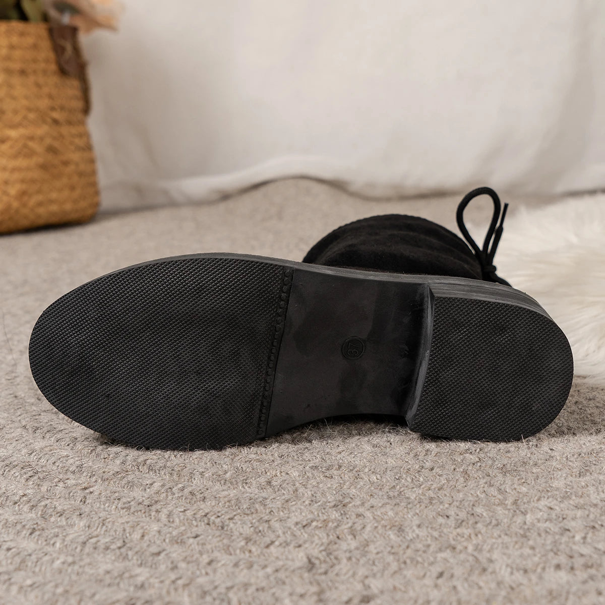 Women's low heel ankle boots with drawstring closure