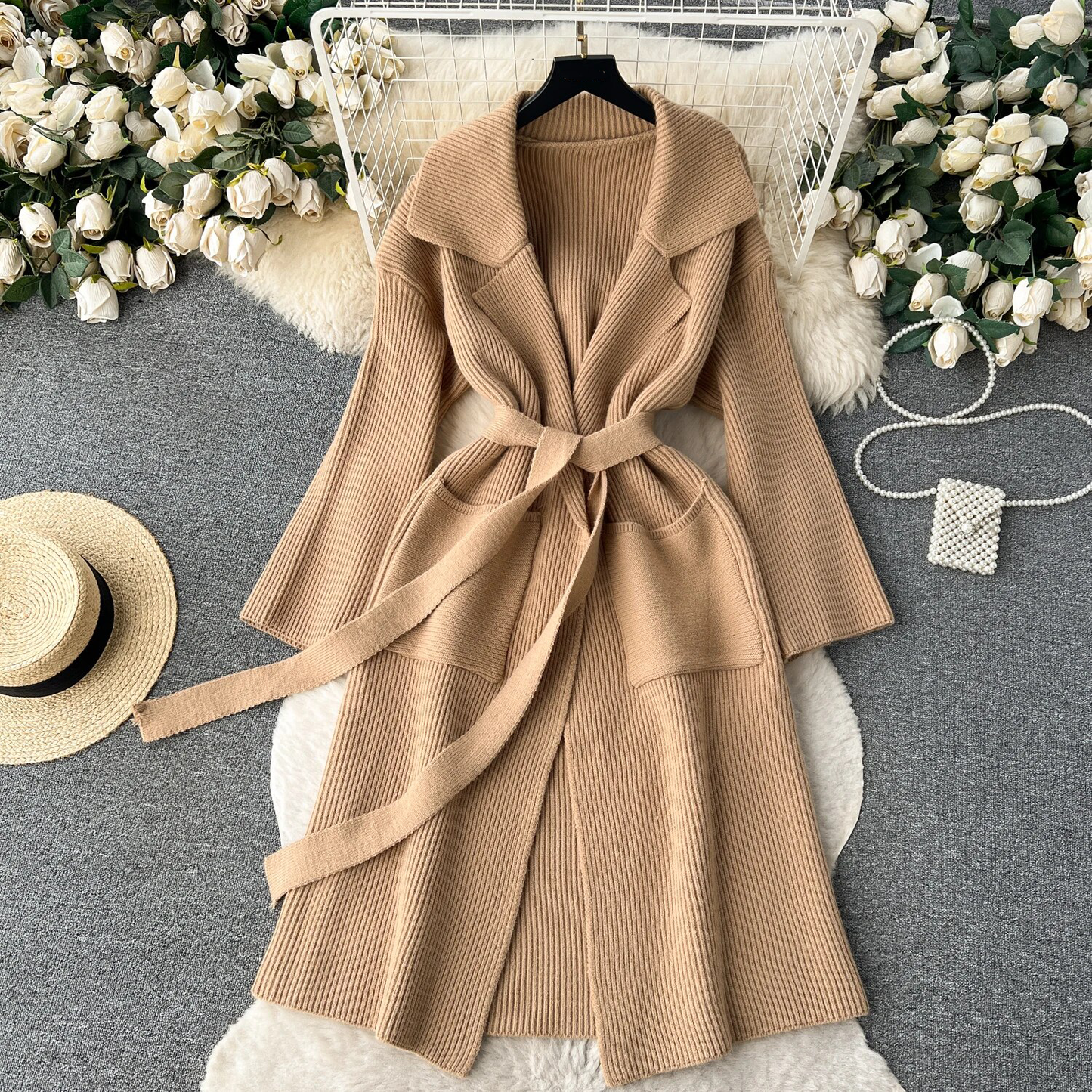 Women's knitted coat with lapel collar