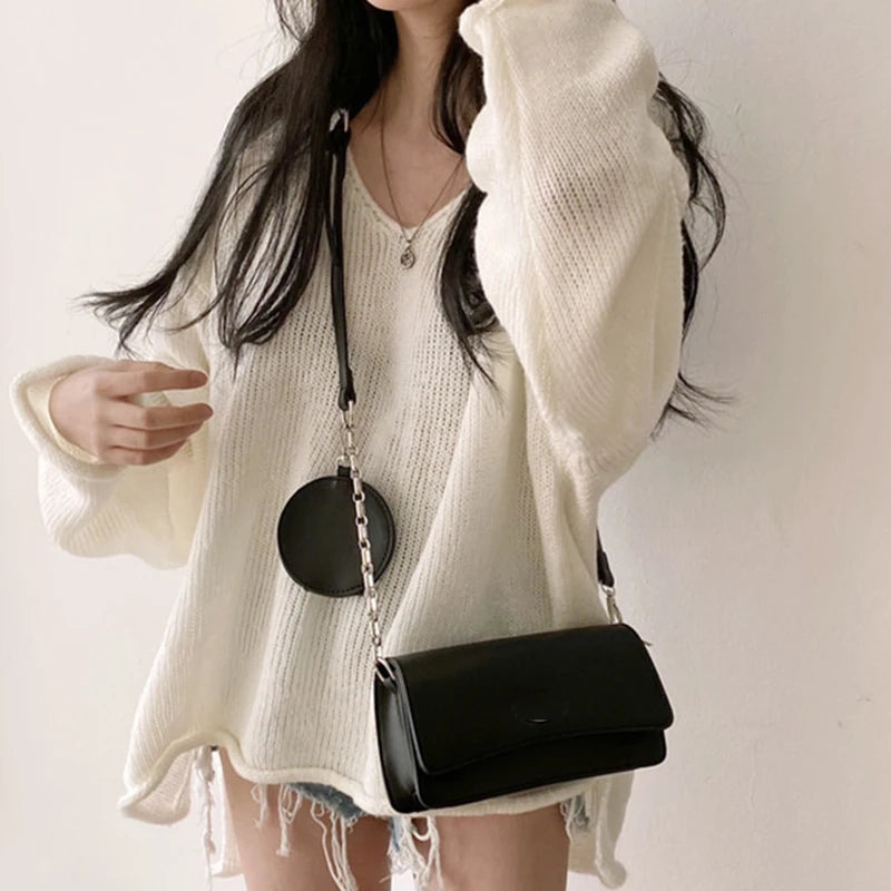 Women's vintage loose v-neck slit rolled edge sweater