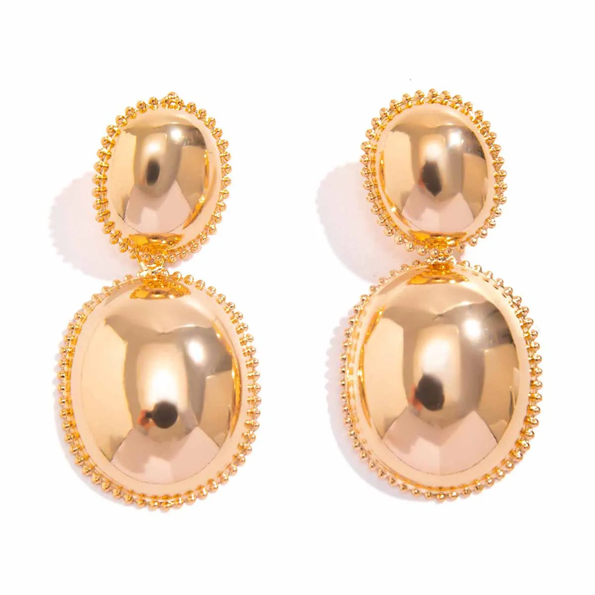 Trendy gothic ball drop earrings with piercing detail