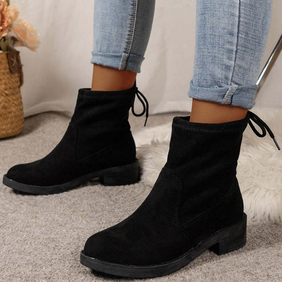 Women's low heel ankle boots with drawstring closure