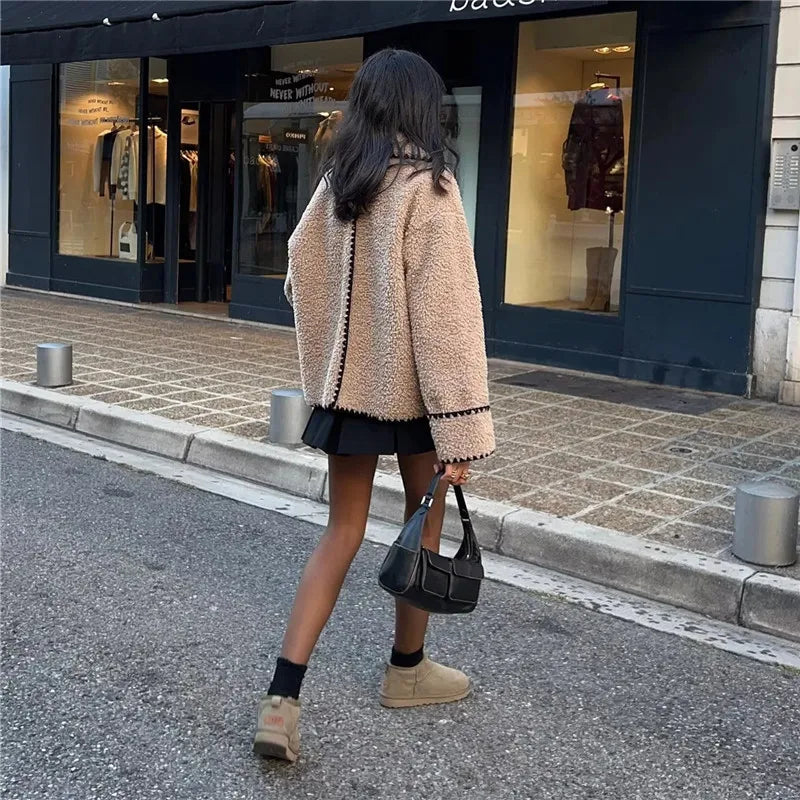 Women's casual coat for hidden button closure