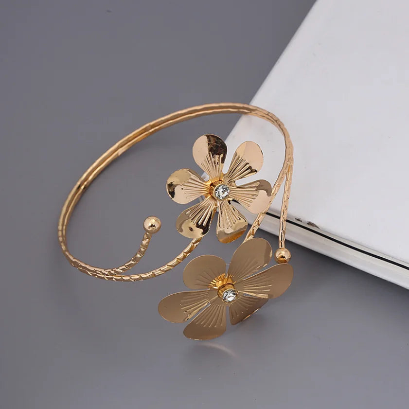 Gold Circle Arm Ring with Flower Detail