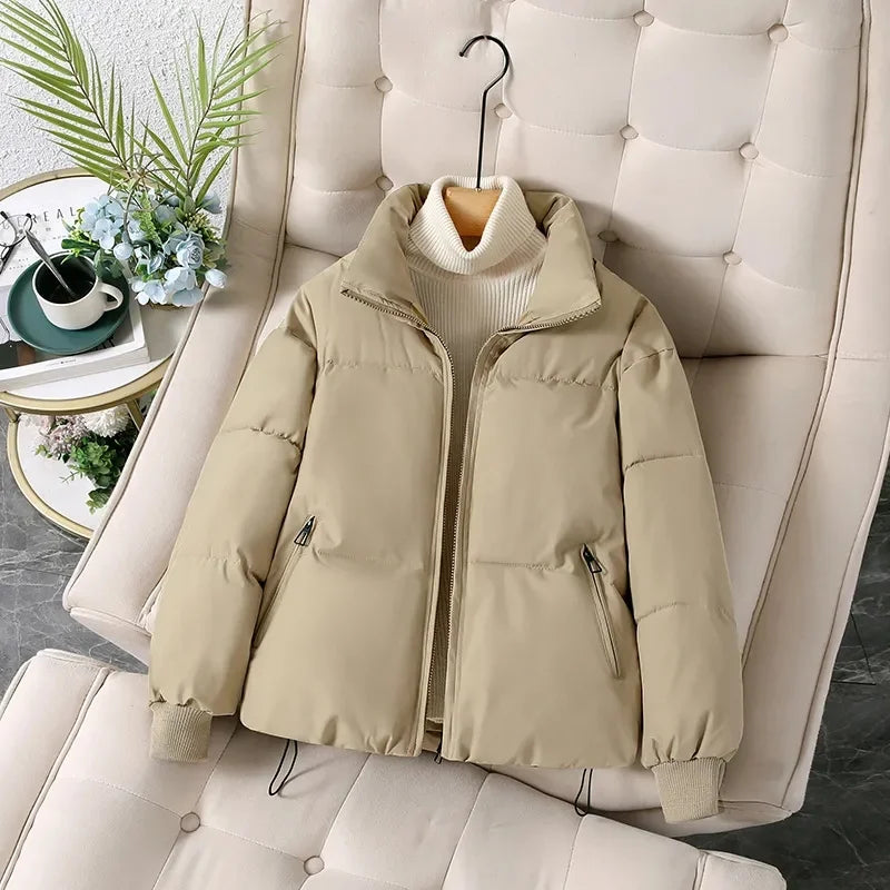 Women's winter puffer jacket with a stand collar