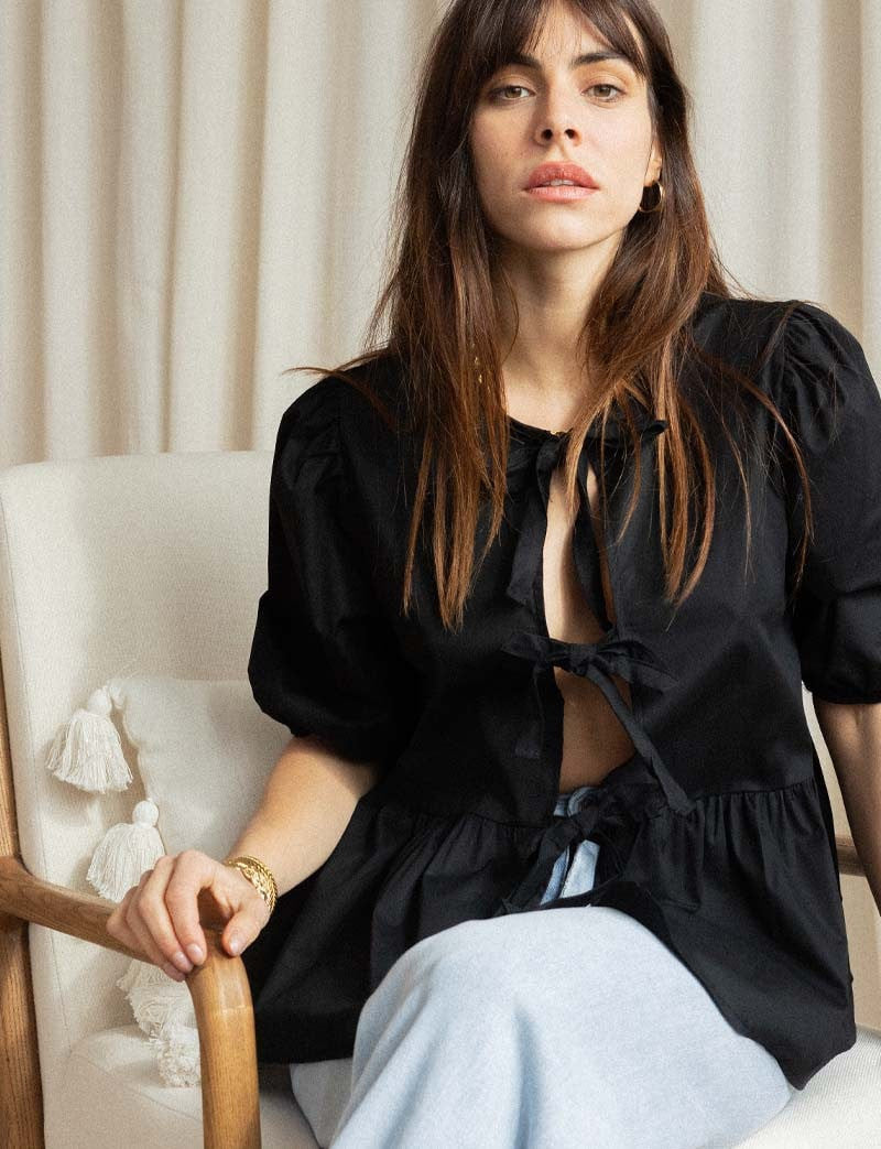 Women's puff-sleeve peplum bow top