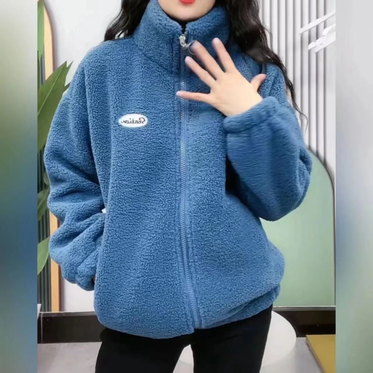 Women’s loose fit teddy jacket with drop shoulder