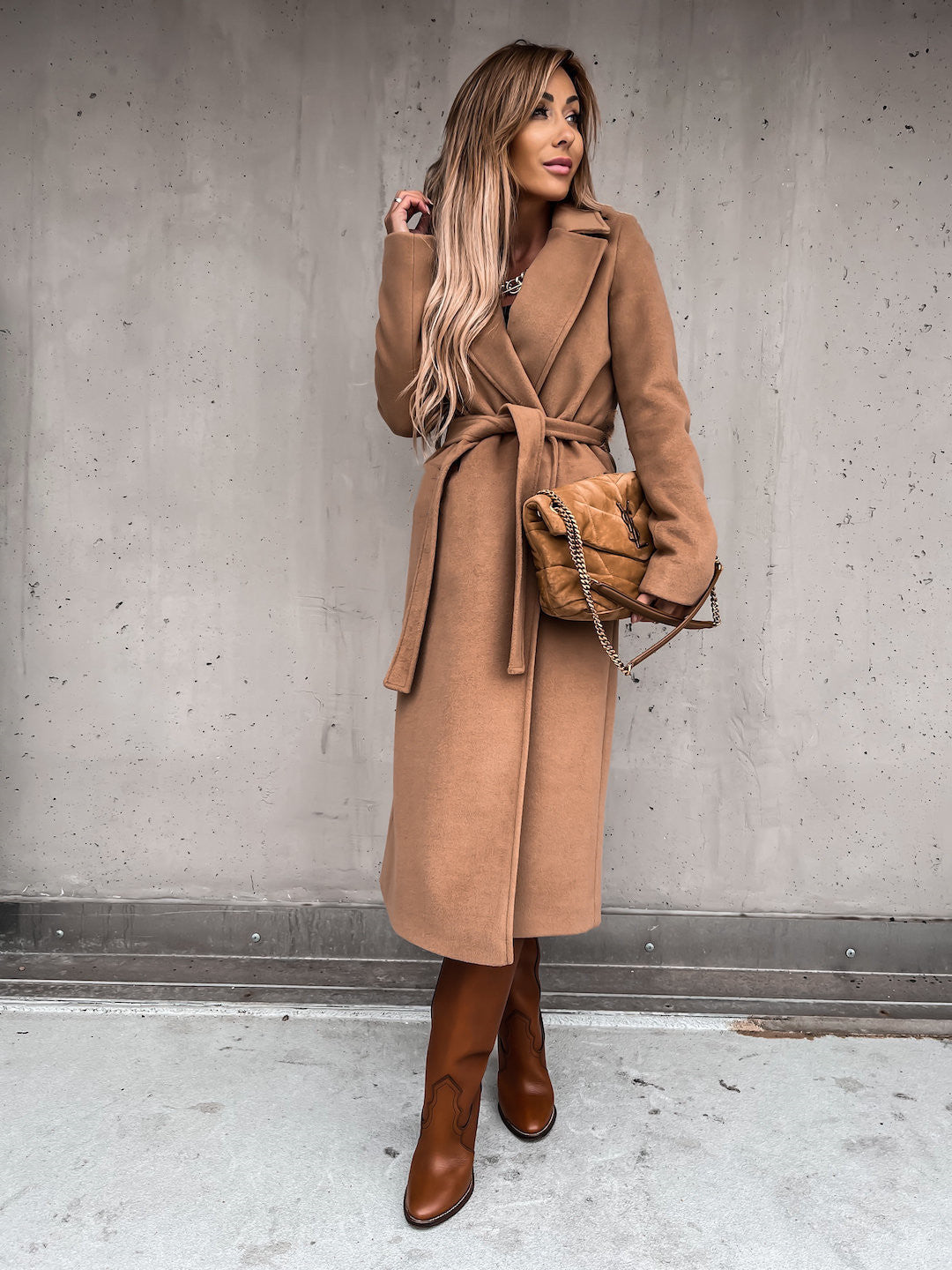 Women's long belted coat with notched collar