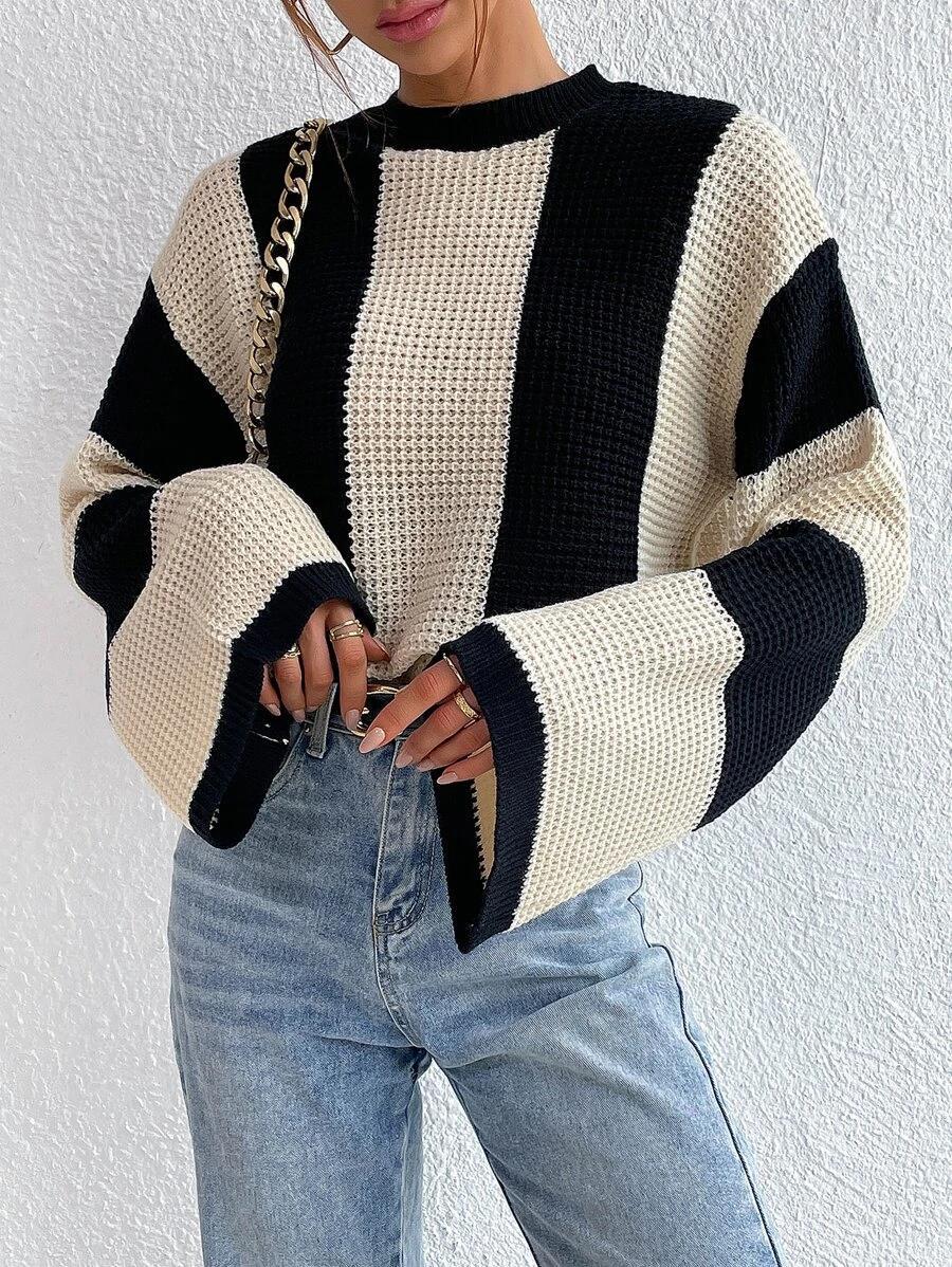 Women's striped sweater in black and white
