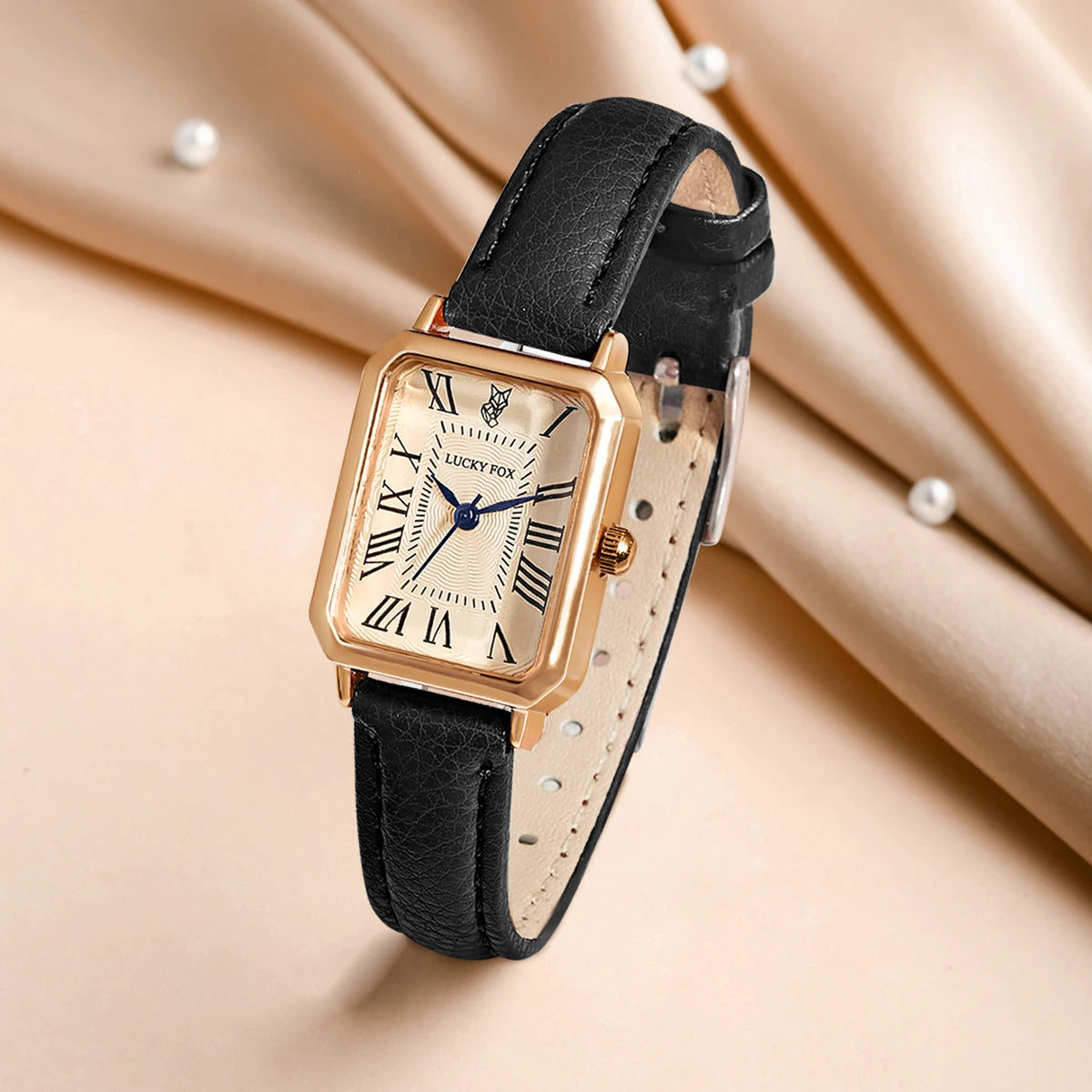 Women's vintage-inspired rectangular watch with leather strap