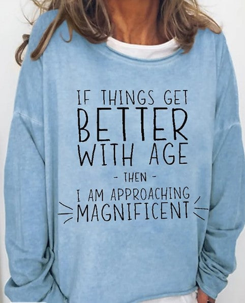Women's oversized graphic sweatshirt with humorous age quote
