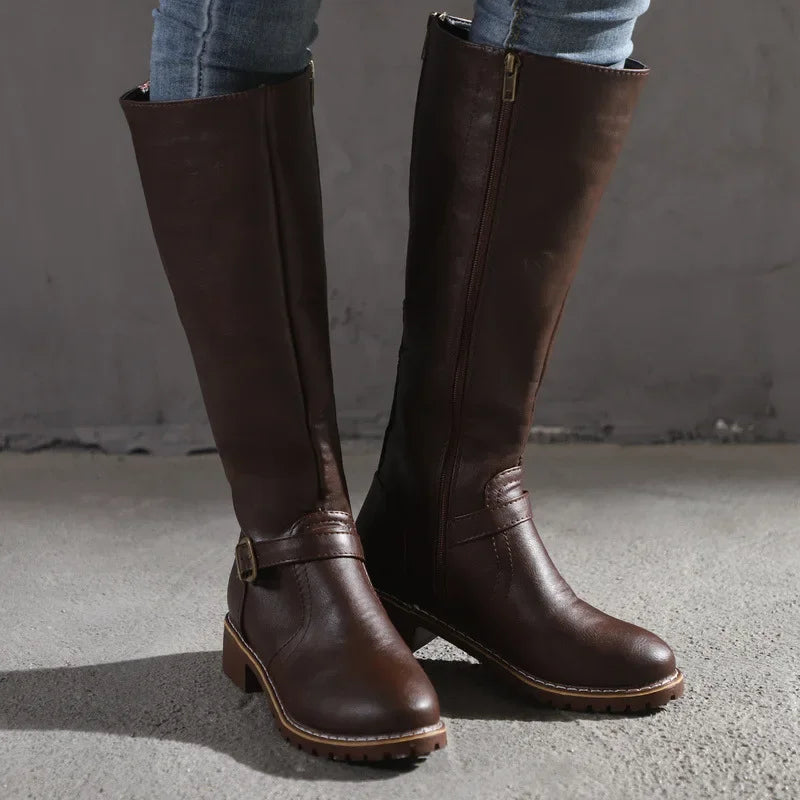 Women's high-top biker boots with chunky heel and buckle design