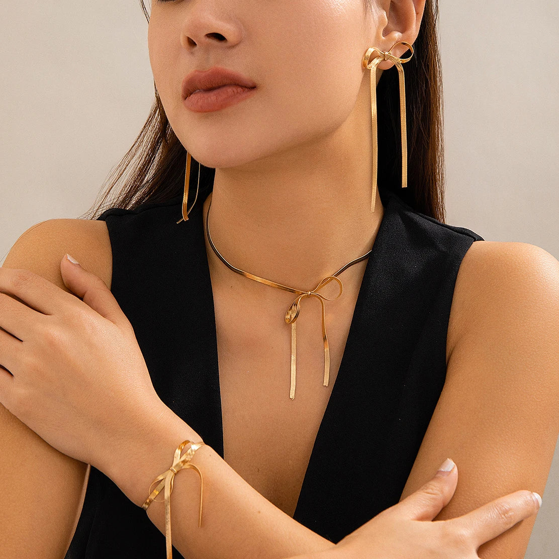 Stylish snake chain jewelry set with tassel drop earrings