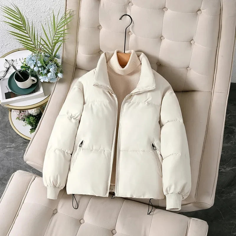 Women's winter puffer jacket with a stand collar