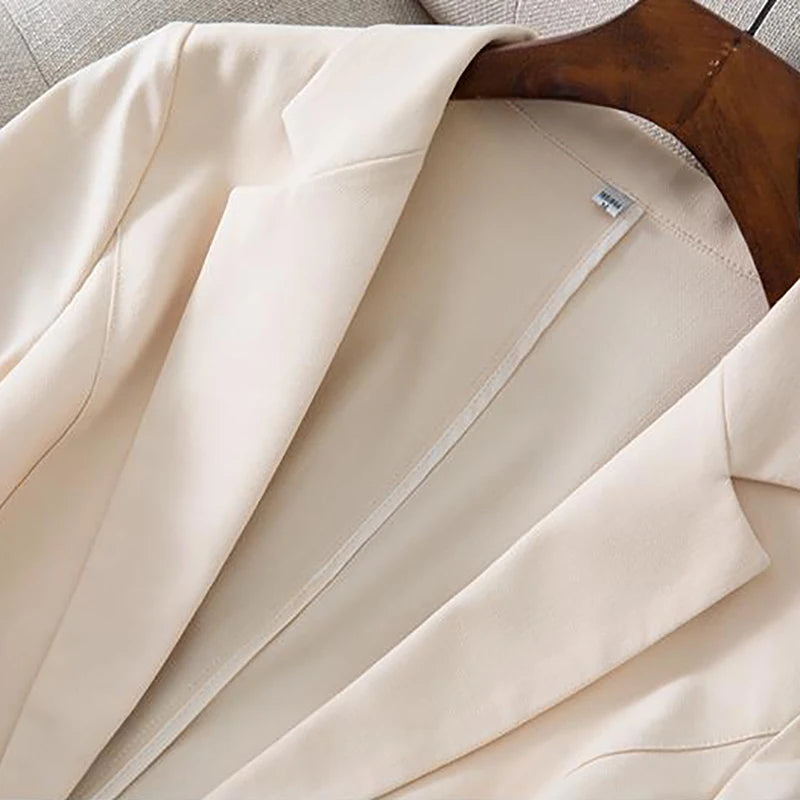 Women's double-breasted blazer with button detailing