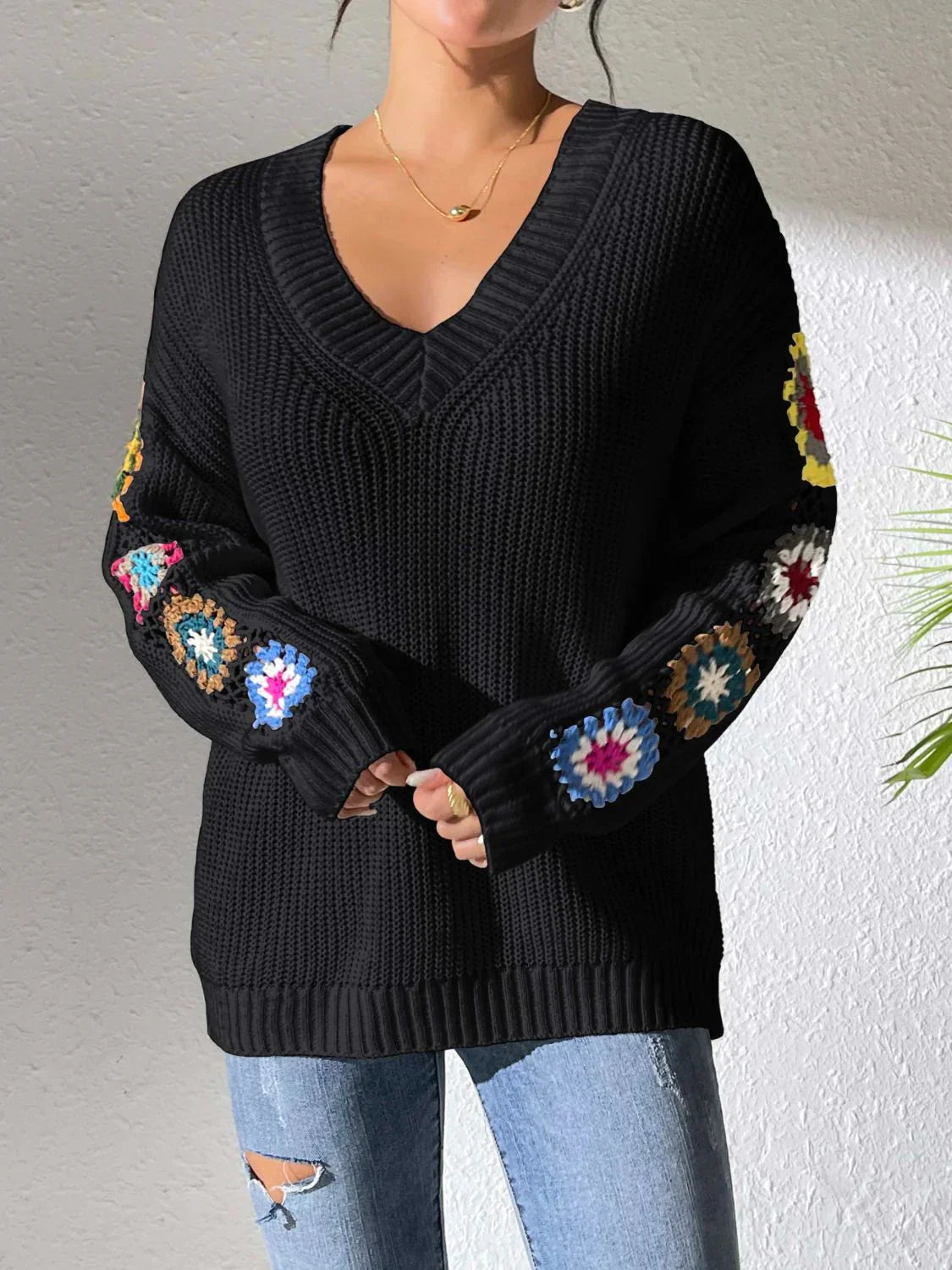 Women's v neck sweater with floral print on each long sleeves