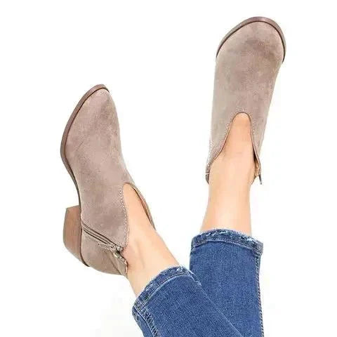 Women's v-cut pointed toe zip-up boots