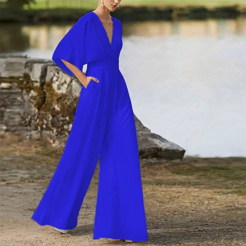 Women's Jumpsuit - Wide-Leg Flowy Fit - Deep V-Neck - Three-Quarter Sleeves - Elegant Waist