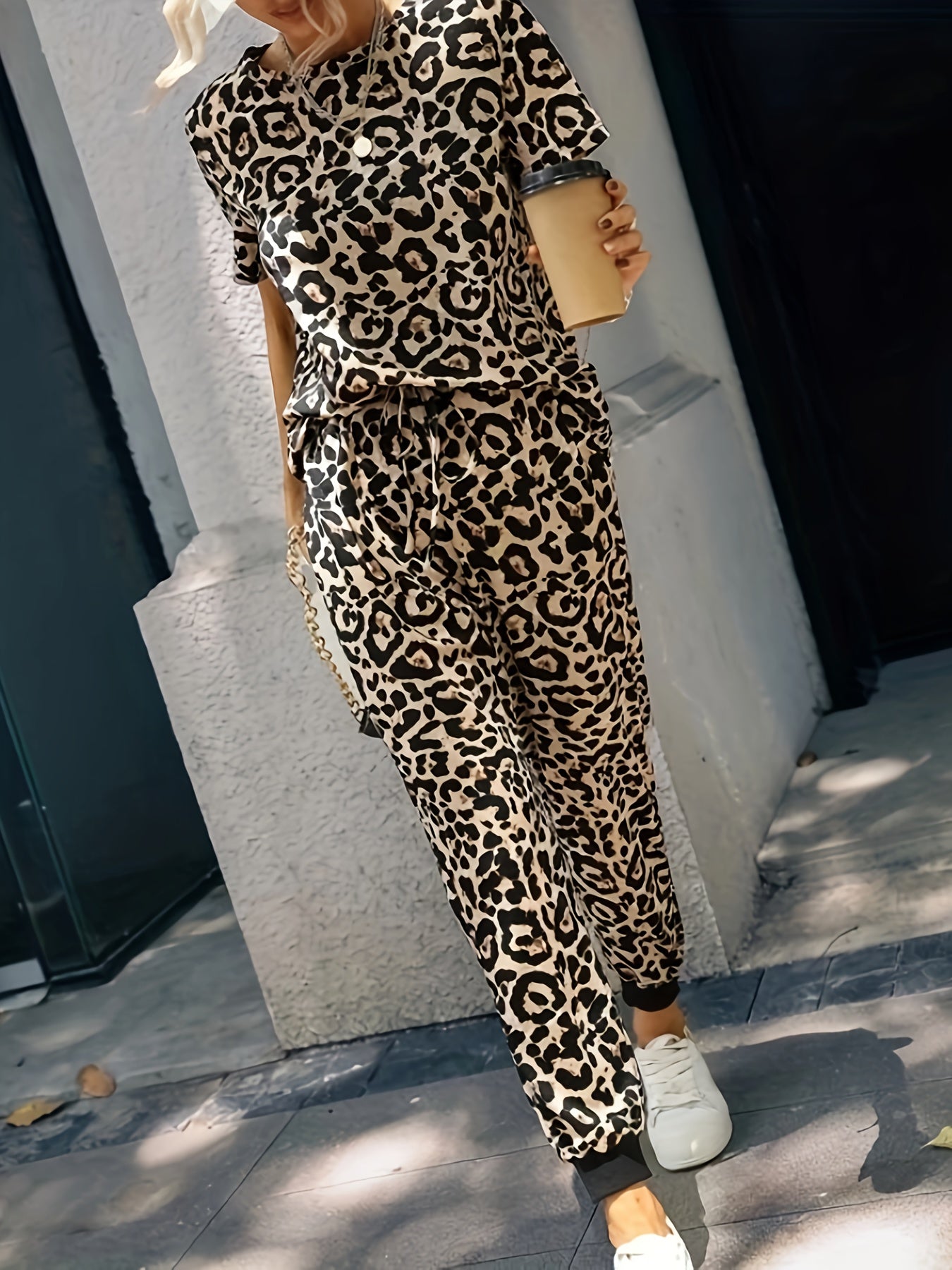 Leopard print two-piece set with casual top and drawstring pants for women