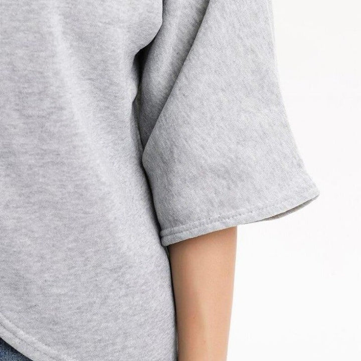 Women's poncho sweater with turtleneck