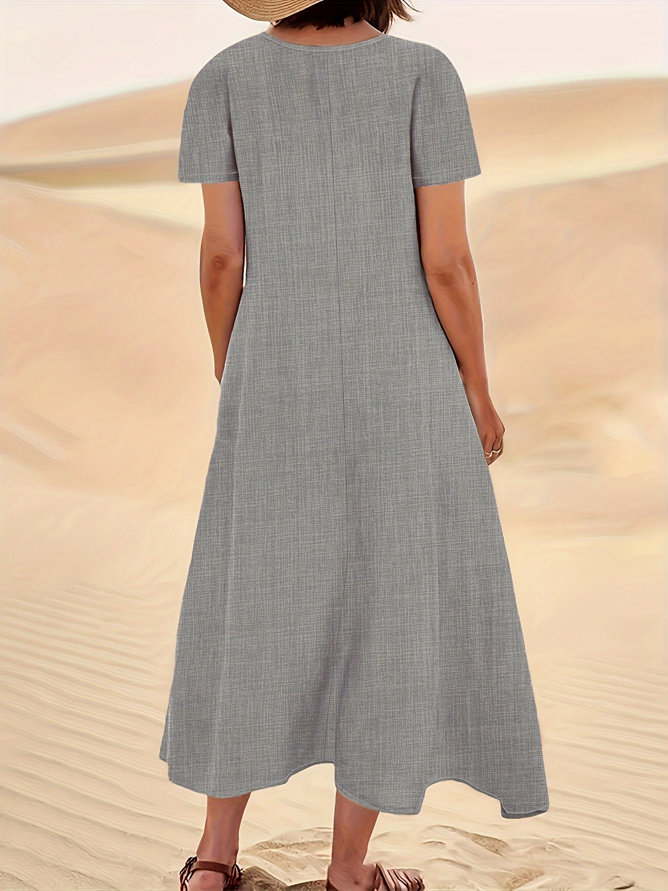 Flowy short-sleeve maxi dress with side pockets for casual and vacation wear for women