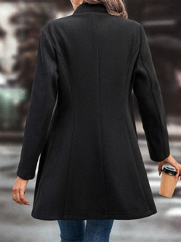 Women's black coat with button closure