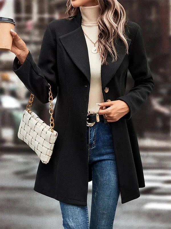 Women's black coat with button closure