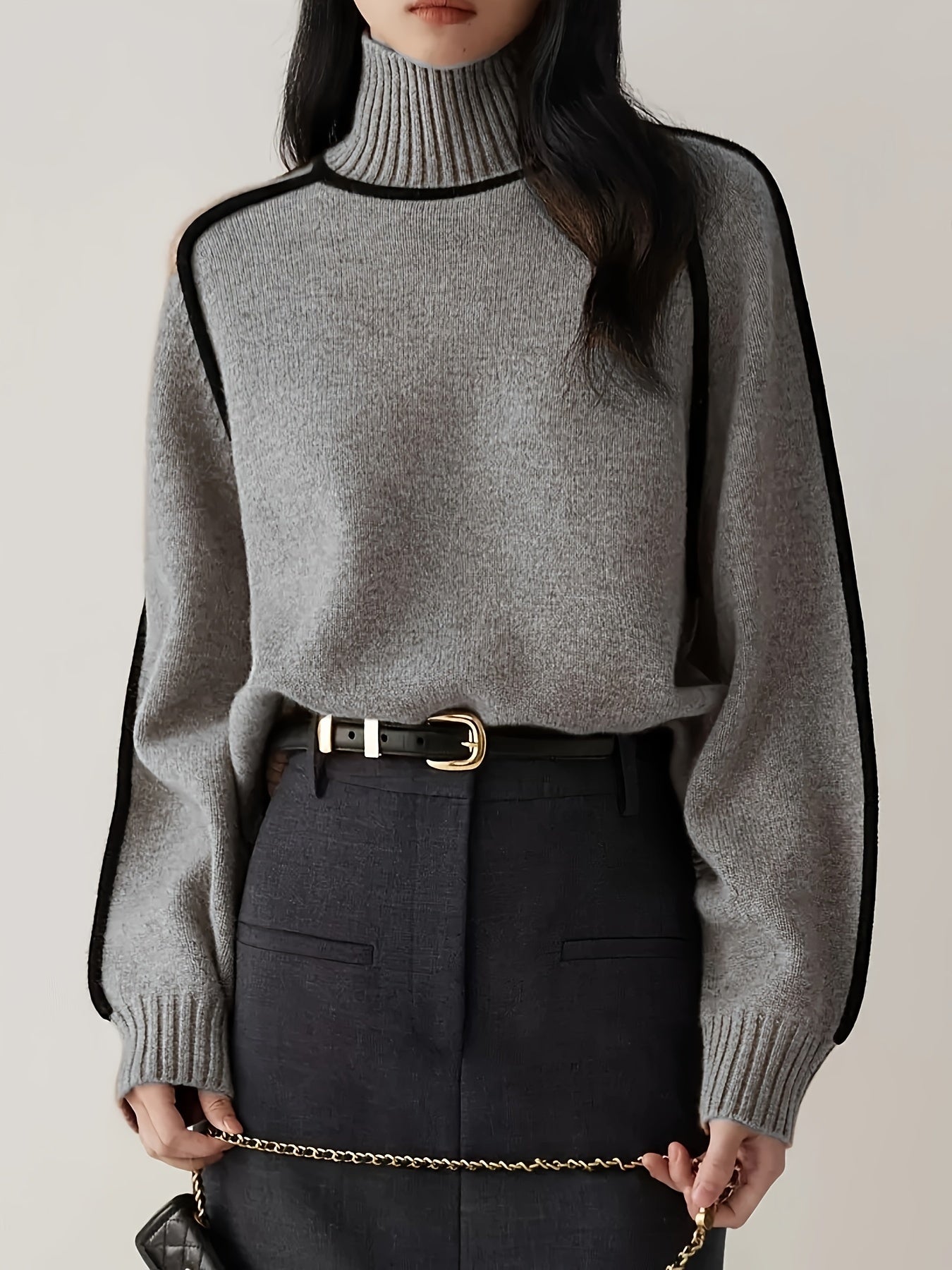 High-neck knit sweater with outlined design and long sleeves for women