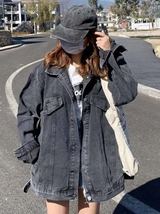 Women's long sleeve denim jacket with button closure