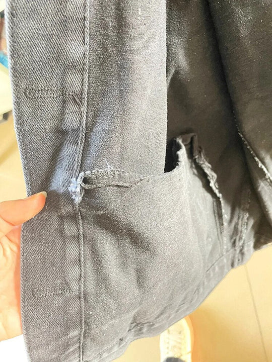 Women's long sleeve denim jacket with button closure