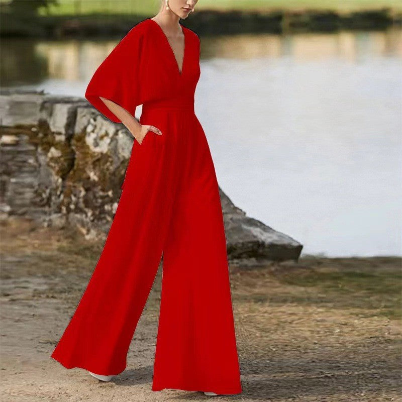 Women's Jumpsuit - Wide-Leg Flowy Fit - Deep V-Neck - Three-Quarter Sleeves - Elegant Waist