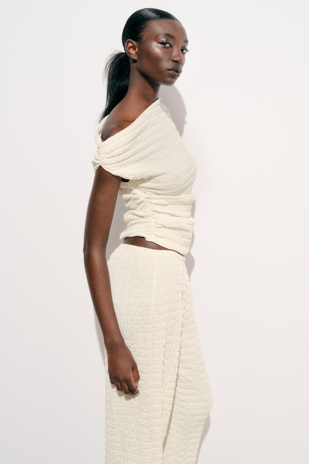 Oluwatoyin - asymmetry set with ruffled texture