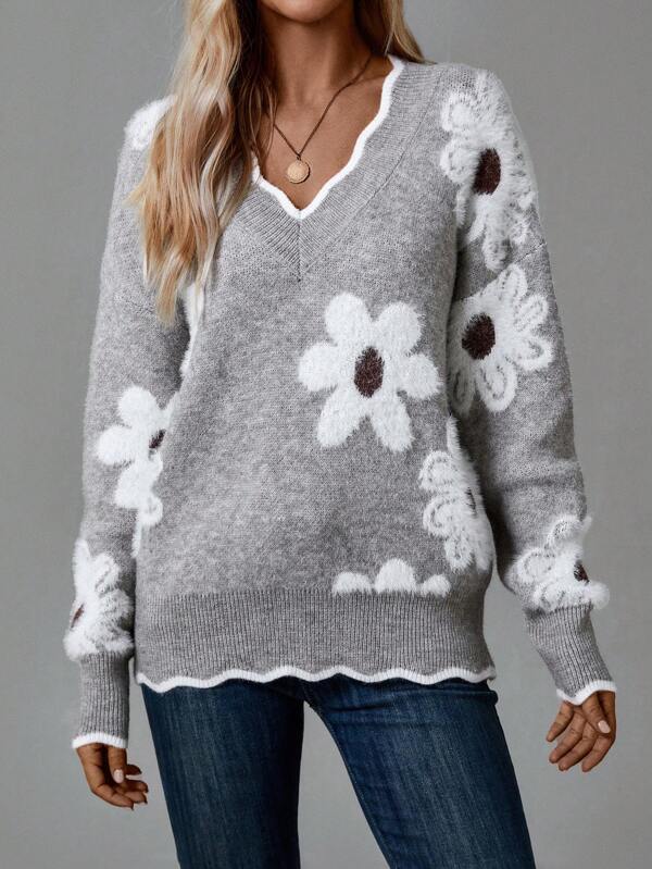 Elegant women's pullover knitted sweater with floral pattern