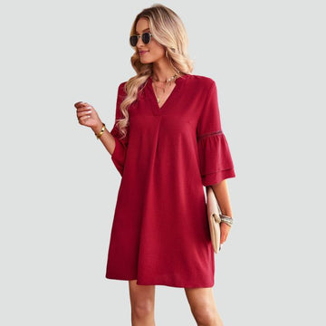 Laarni - chic tunic dress with ruffled sleeves