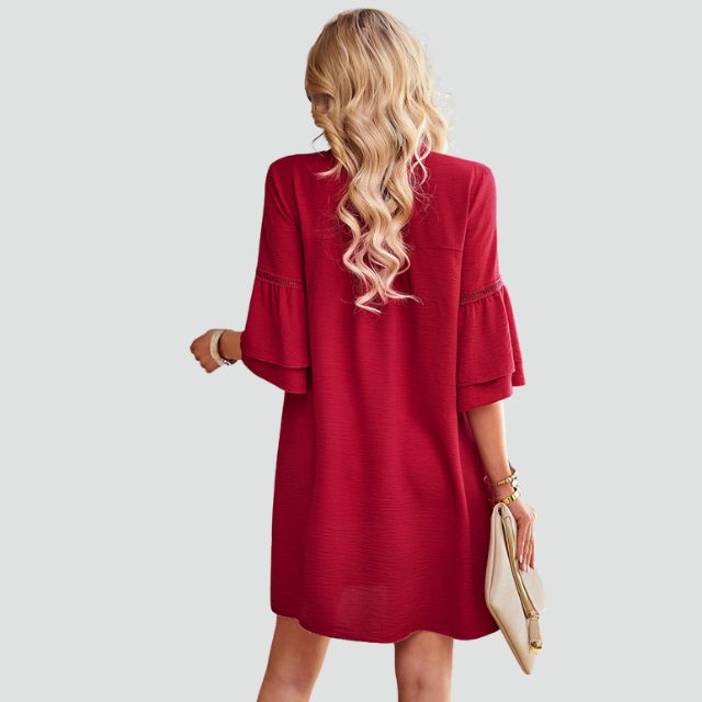 Laarni - chic tunic dress with ruffled sleeves