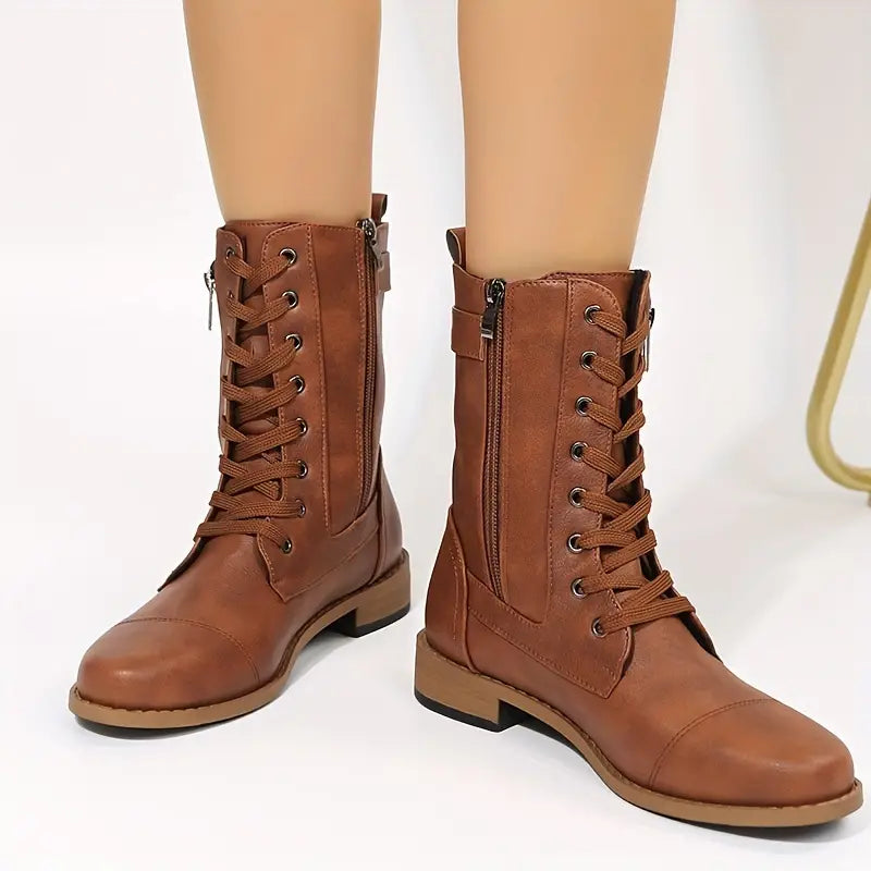 Women's low-cut lace-up boots with zipper closure