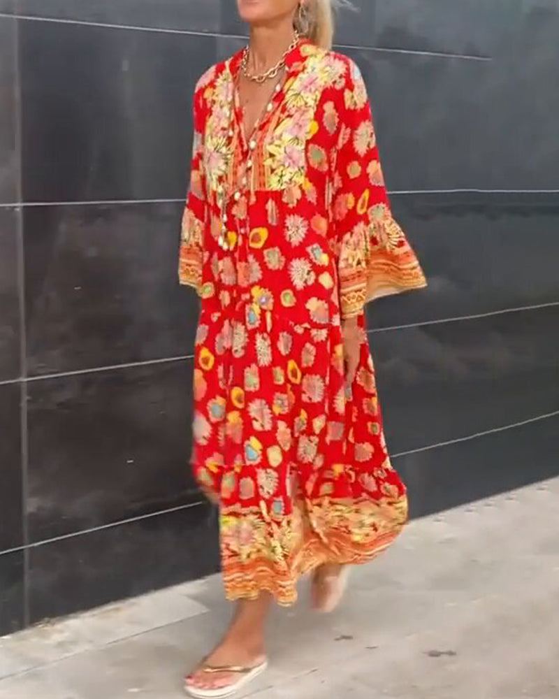 Women's loose dress with print and V-neckline