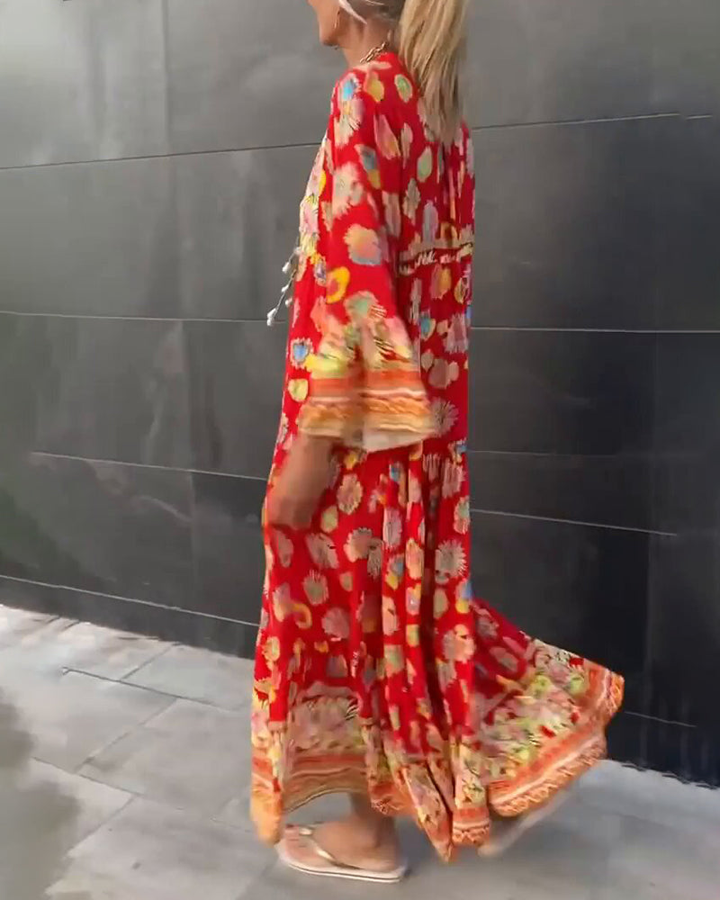 Women's loose dress with print and V-neckline