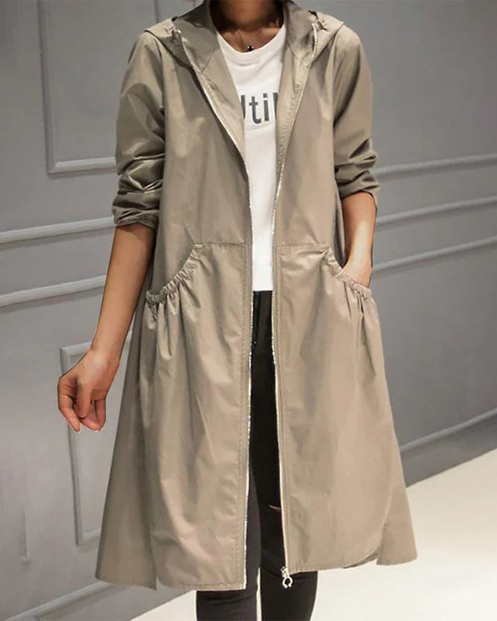 Comfortable long hooded jacket for women with zipper closure and front pocket