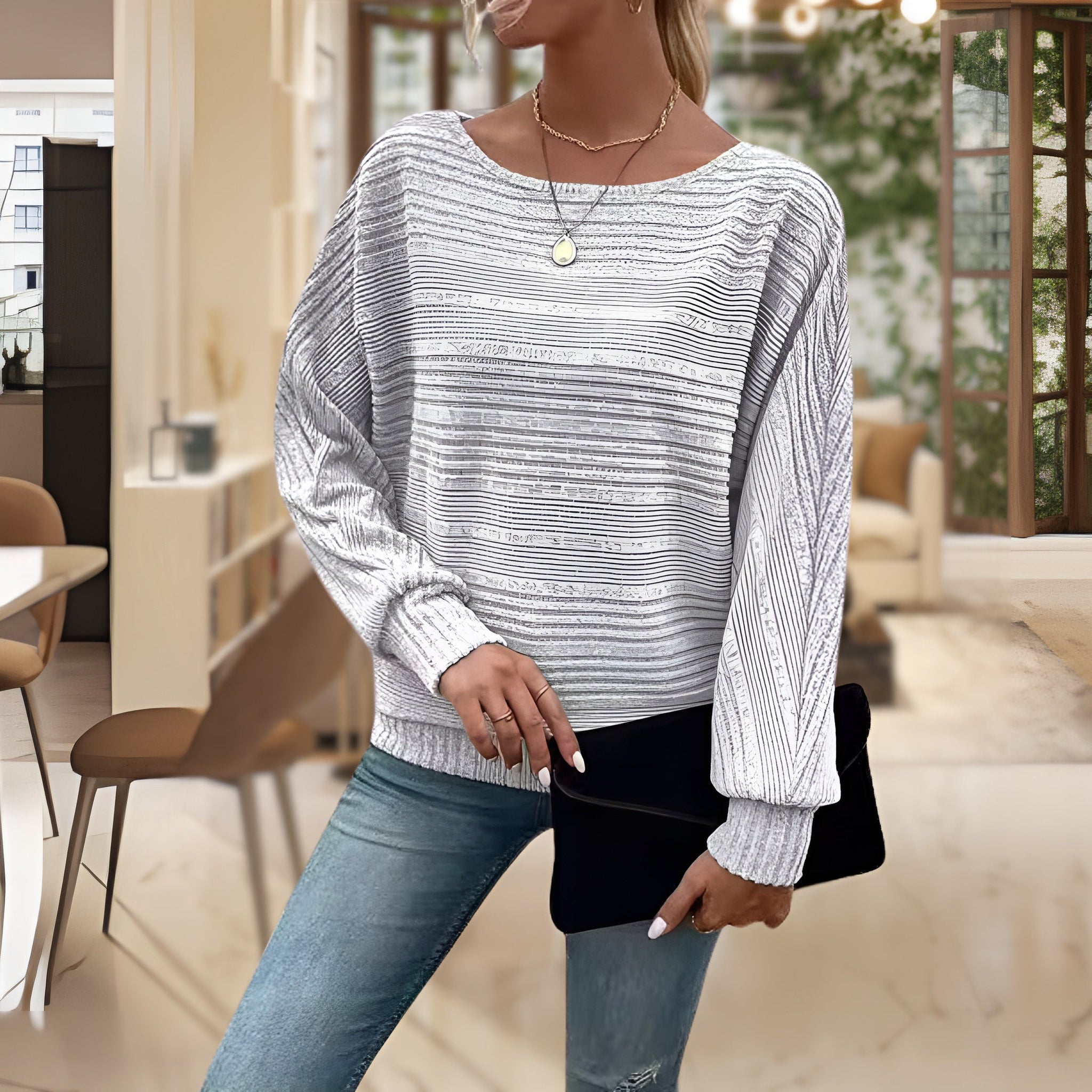 Women's cozy sweater with striped