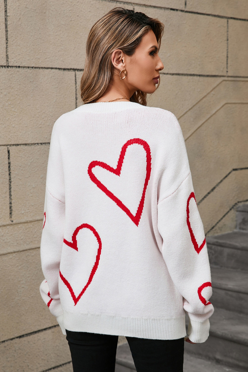 Women's hollow heart dropped shoulder sweater