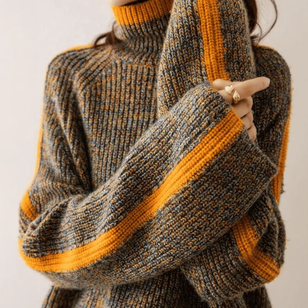 Women's loose knit turtleneck sweater with orange strip