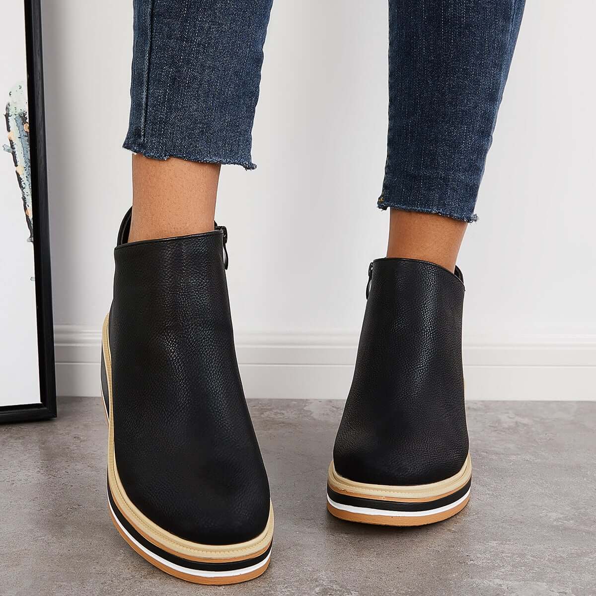 Novi - stylish ankle boots with zip and platform