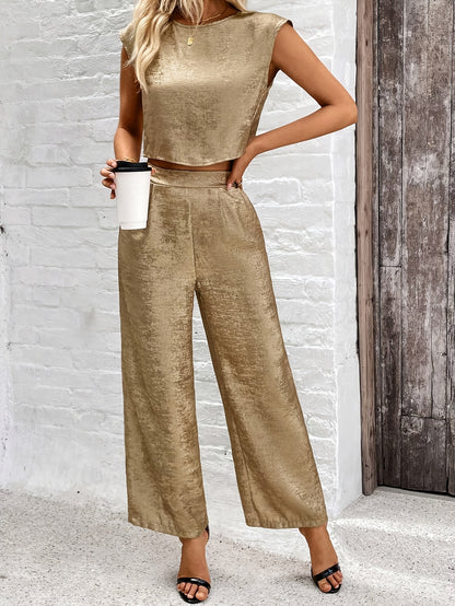 Elegant sleeveless crop top and wide-leg pants set for women