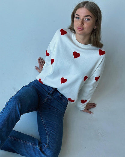 Women's solid color round neck knitted sweater with heart print