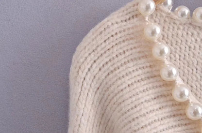 Women's faux pearl sweater