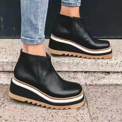 Women's leather boots with side zipper