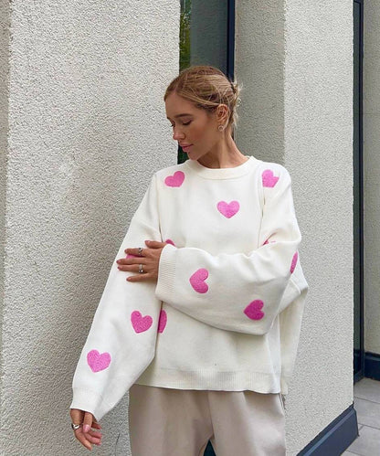 Women's solid color round neck knitted sweater with heart print