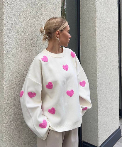 Women's solid color round neck knitted sweater with heart print