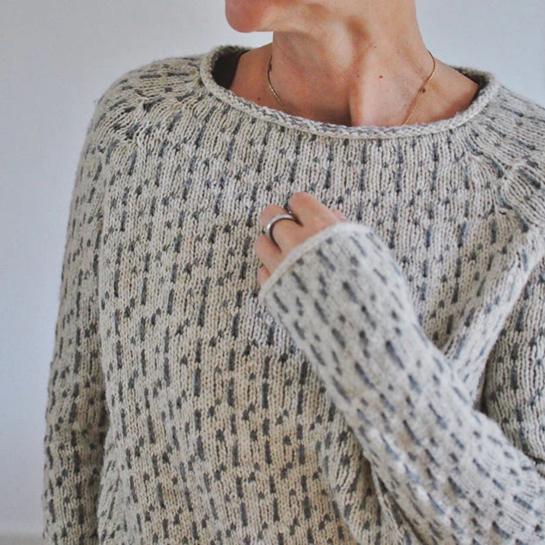 Women's knitted sweater with round neck