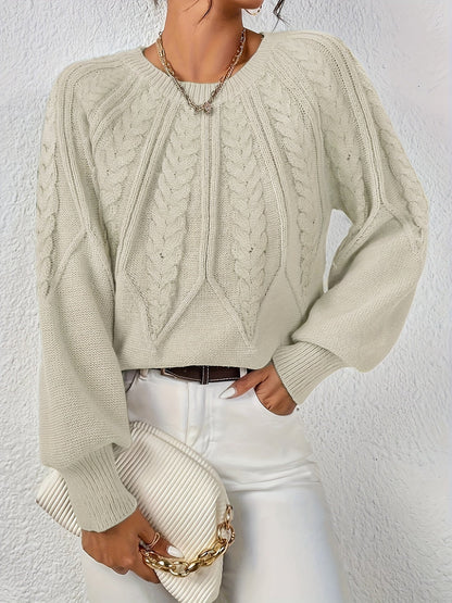 Women's round neck knitted pullover with cable pattern